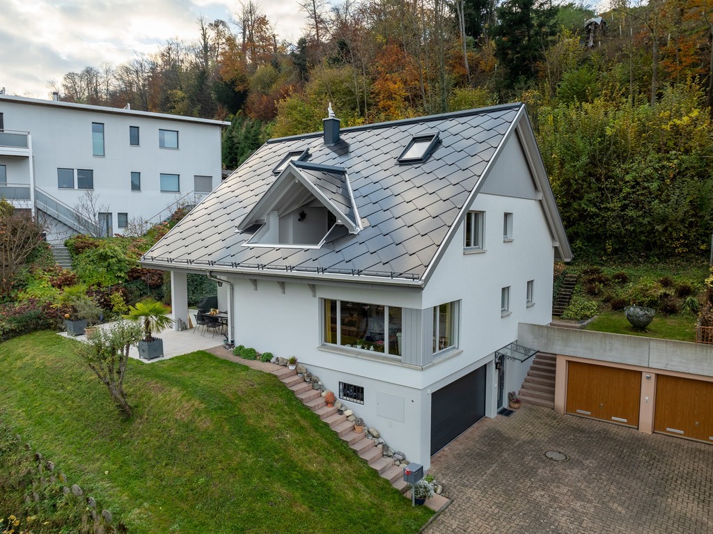 Aerial view of a completed solar roof installation on a Long Island home