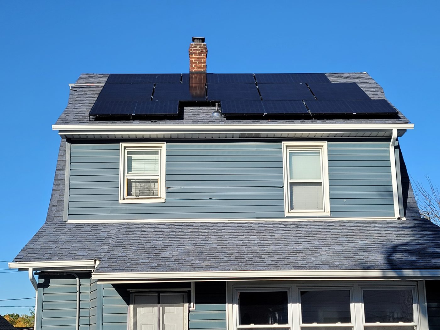Rooftop solar panel installation on a New York City home