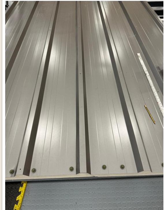 Bare insulated metal wall panel before installation